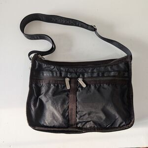 Black LeSportsac Crossbody Bag Deluxe Everyday Bag in Black Shine messenger